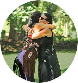 People hugging in oval cutout