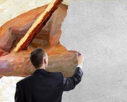 Man in a suit drawing on a wall with a giant hand and pencil illustration, symbolizing self-expression, imagination, and the power of finding your creative outlet.