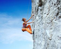 Woman rock climbing