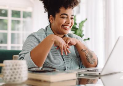 Smiling Woman enjoying an online course