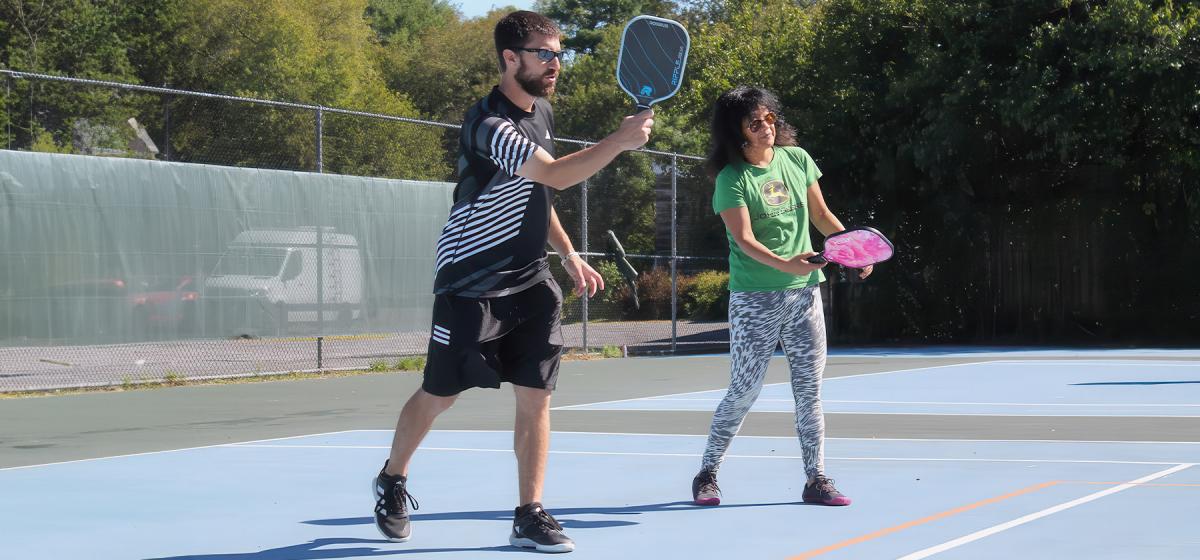 Francis Comesanas leading a pickleball class