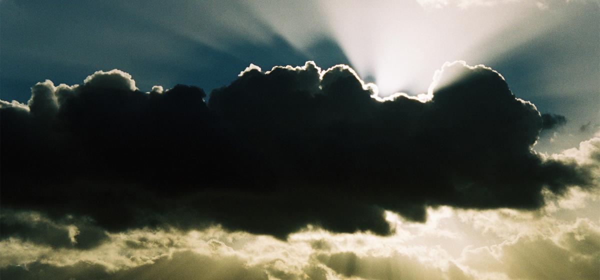 Sun coming through a dark cloud