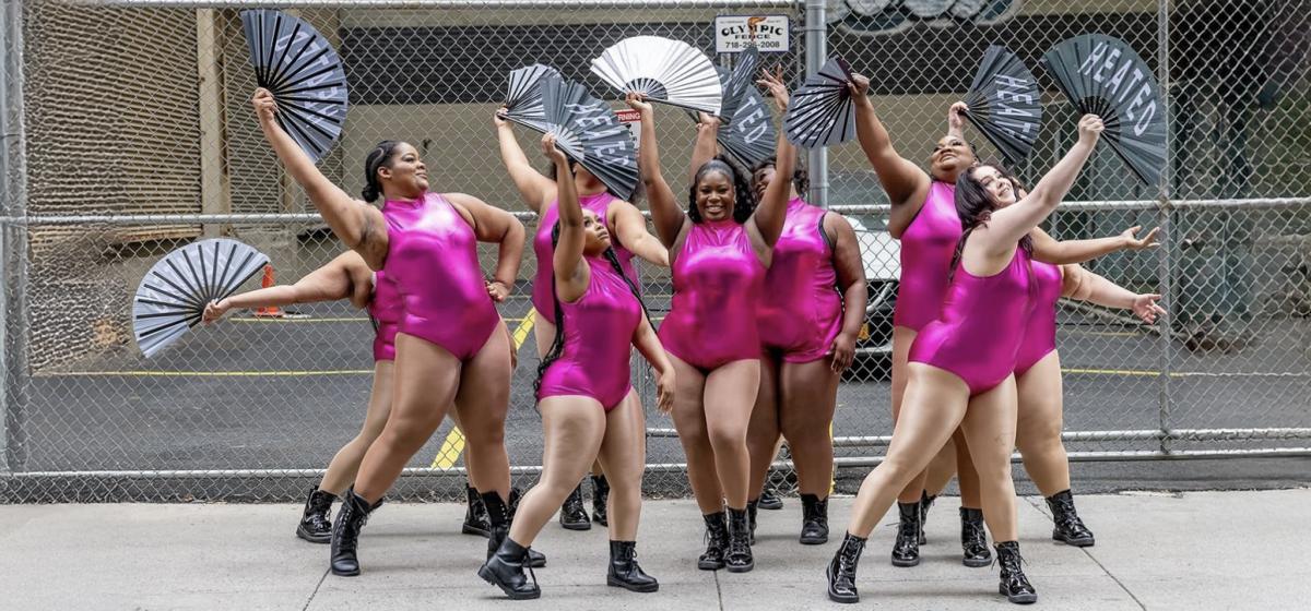 Akira Armstrong and a group of dancers on the street