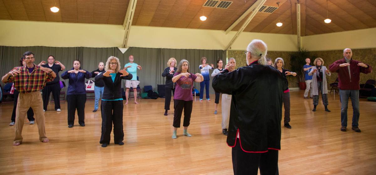 Ken Cohen leading a Yi Quan Qigong class