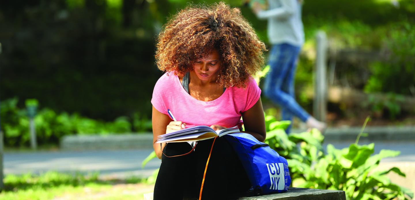 Woman writing in journal