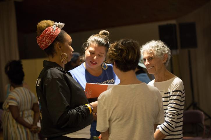 4 women talking together