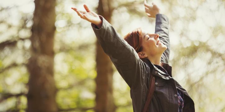 Woman enjoying forest